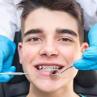 a teen receiving emergency orthodontic treatment